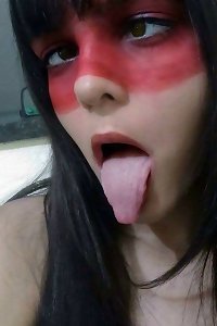 curvy woman slurping donut and posing invitingly