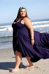 two buxomy femmes caressing each other's boobs voluptuous and sultry